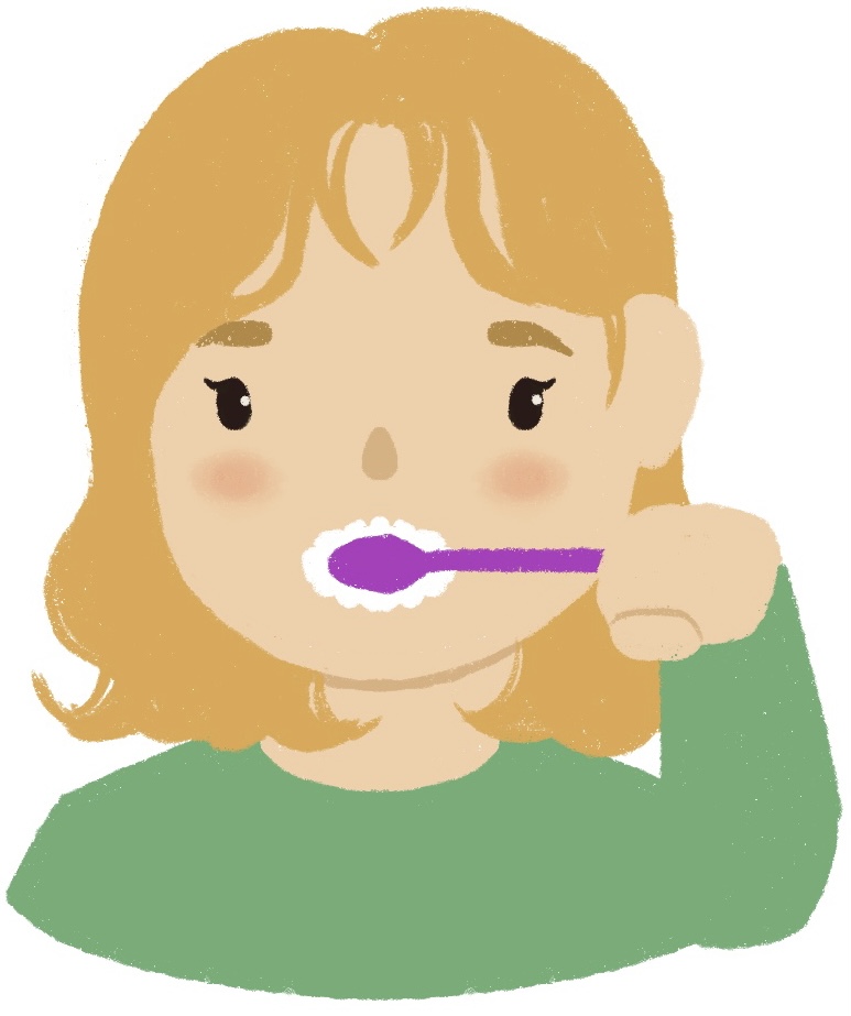 girl brushing her teeth