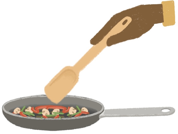 hand stir-frying vegetables in a pan