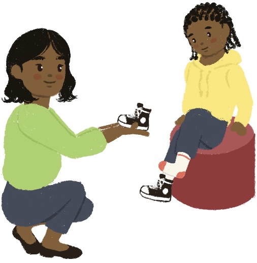 woman helping child put on a sneaker