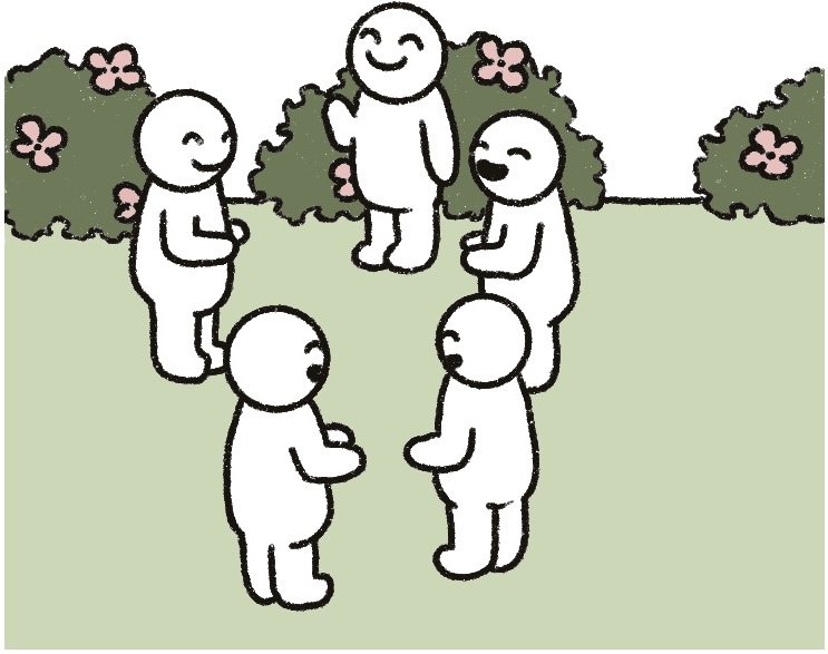 people conversing happily outdoors