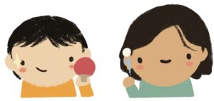 two people holding ping pong equipment