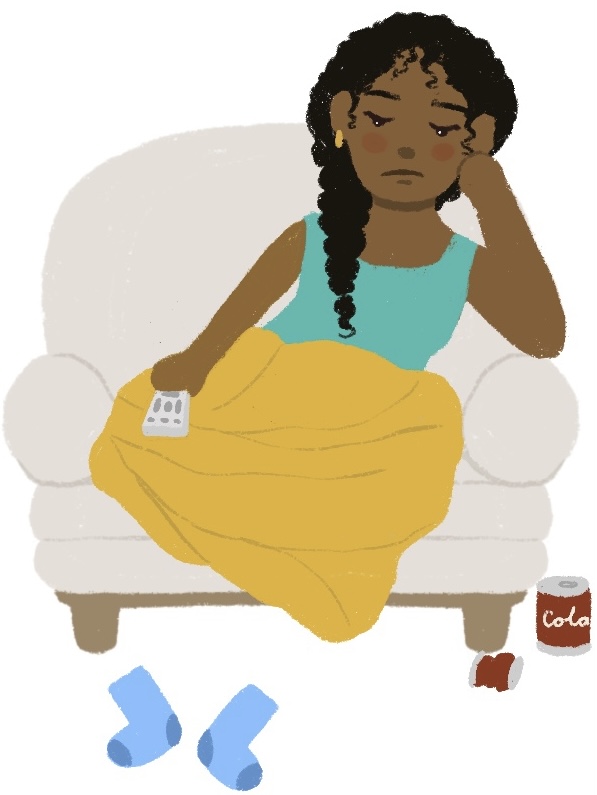 girl sitting on armchair with blanket and TV remote